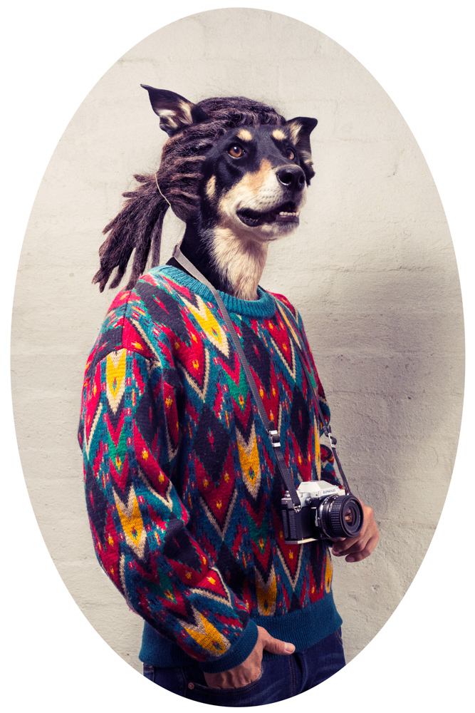hipster wearing a 80's jumper with a dog head and dreadlocks