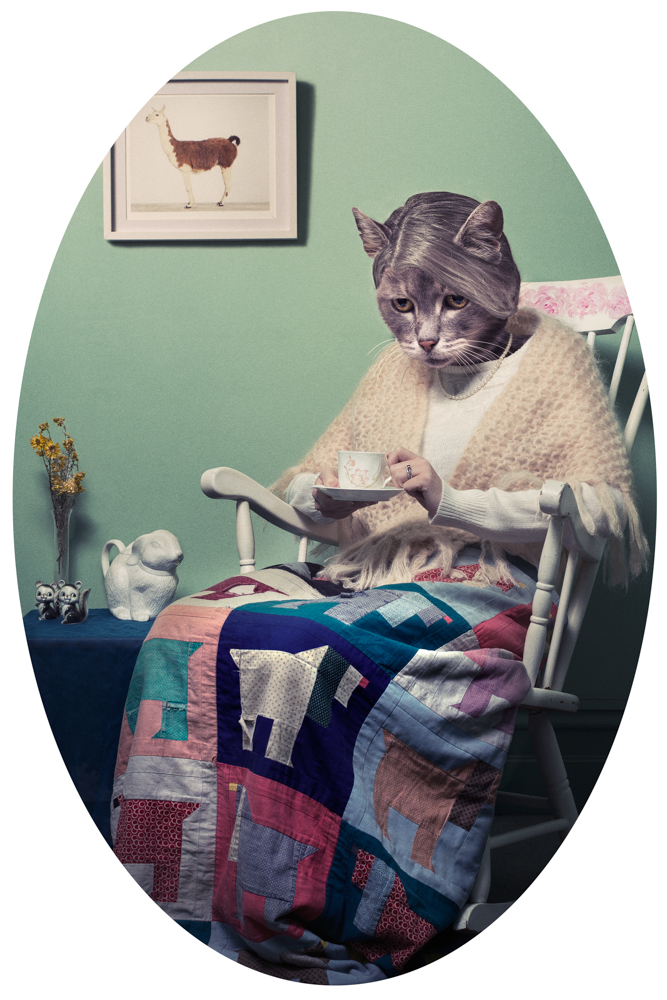 old lady sitting in rocker holding a cup of tea with a cat as a head