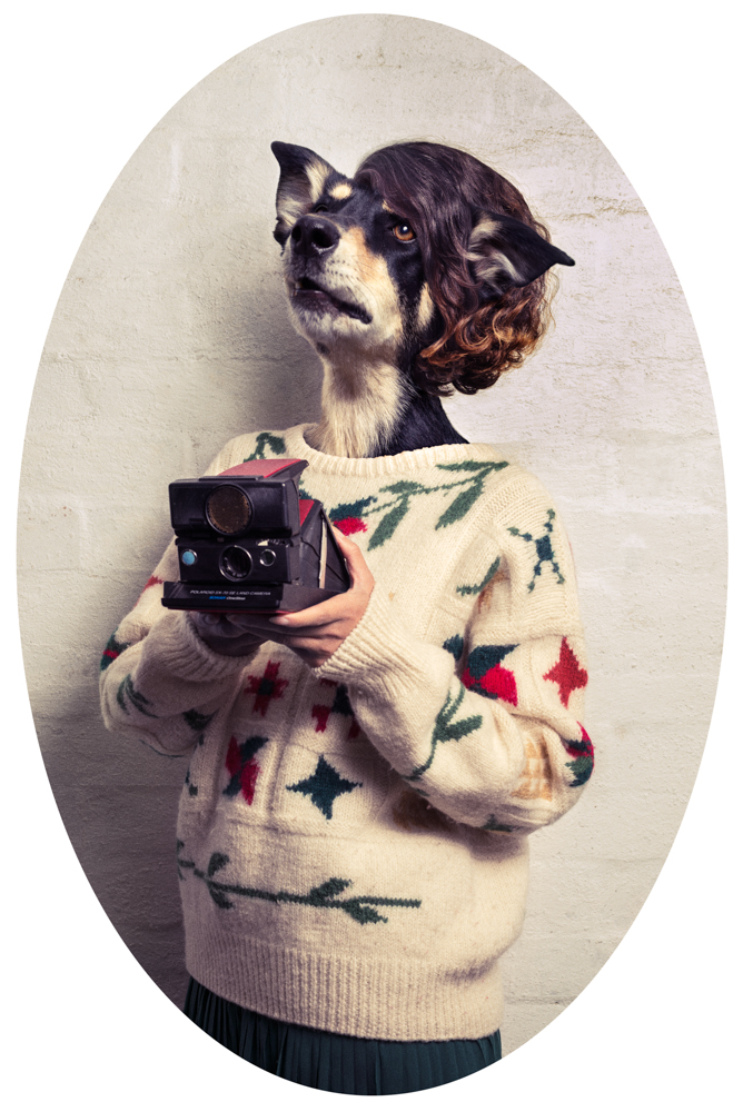 hipster holding a polaroid camera with a dog head