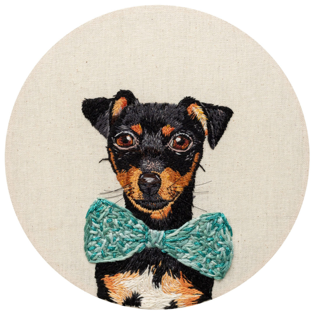 fine art print reproduction of an embroidery of a jack Russell puppy